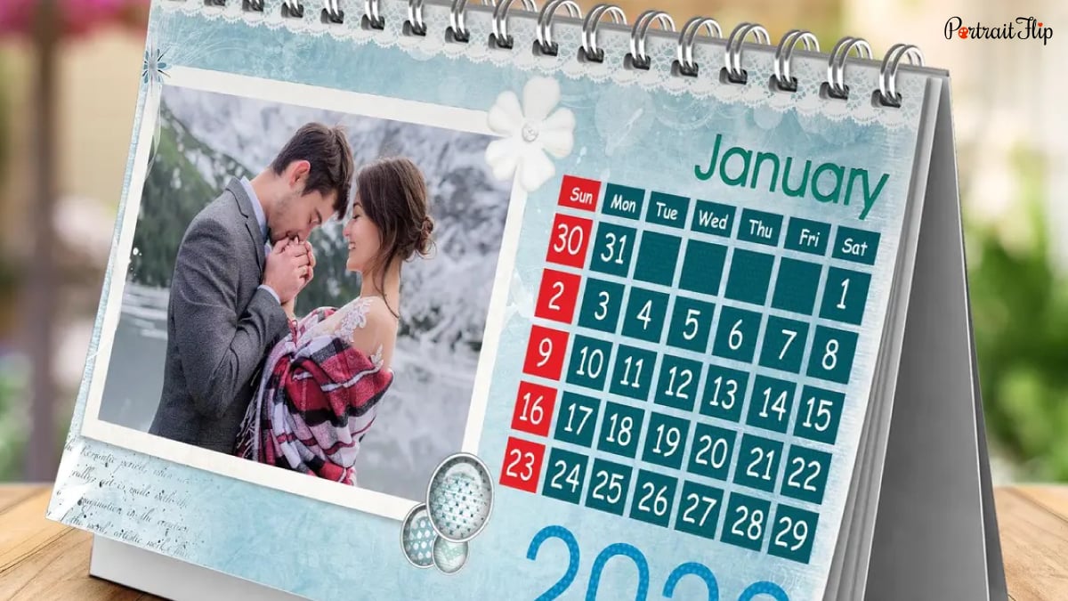 A couples calendar that has a photo of the couple with the month. It is a personalized wedding gift.