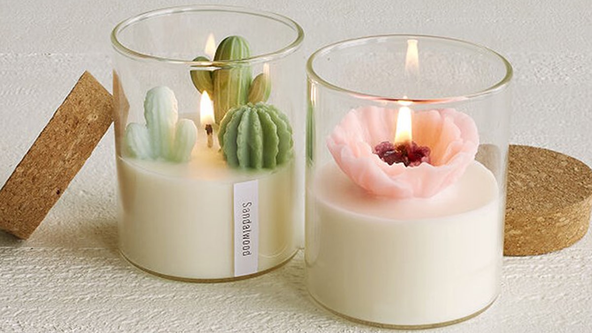 Terrarium candles customized in plant and flower based patterns.