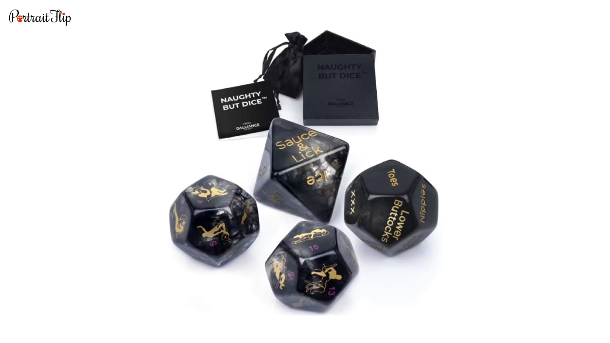 An image of four dices and its called naughty but dice. It is a wedding gift for newly wed couples.