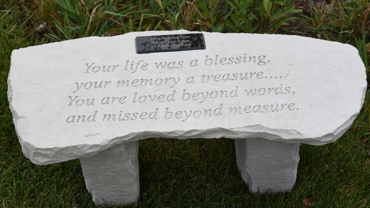 A memory bench in the name of their son as a memorial gift for them. The bench has a quote engraved on it.