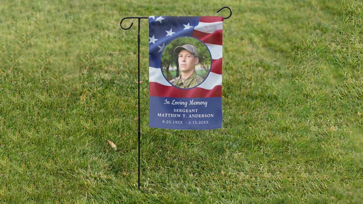 A military memorial flag in the garden yard