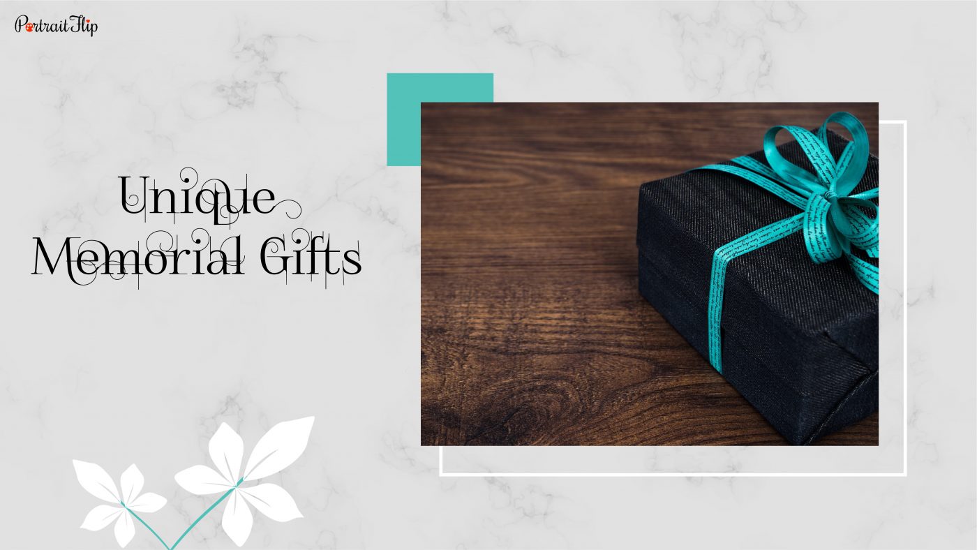 There is a black gift with blue ribbons and the text reads unique memorial gifts.