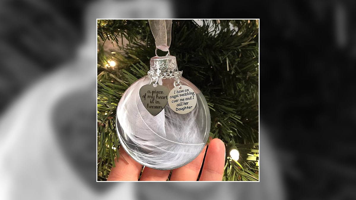 A glass ball ornament for memorial gift for loss of a mother.