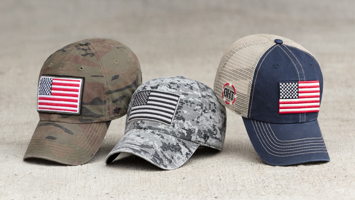 Memorial hats in different colors and patterns with the country flag symbol on it