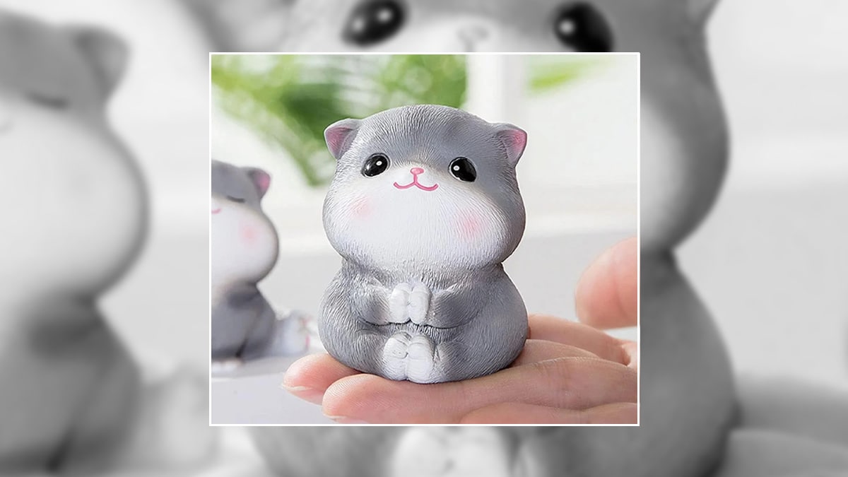 A cat figure toy for someone who lost a pet. A pet memorial gift.