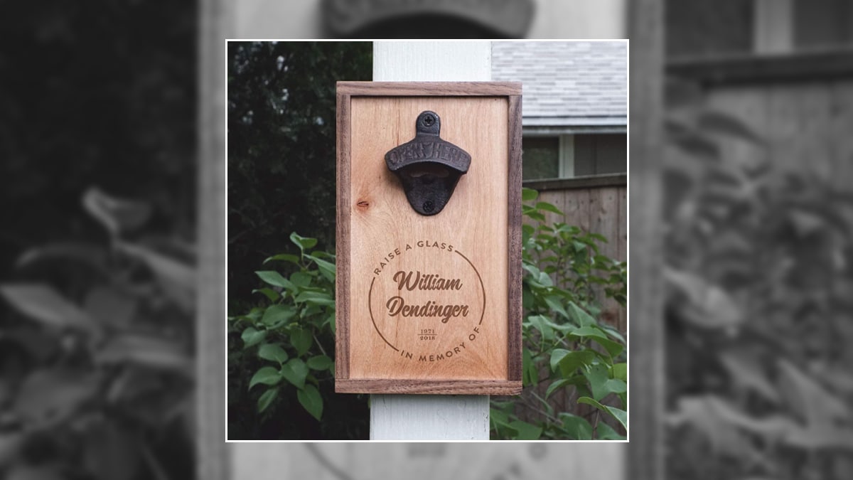 A bottle opener that is dedicated to someone they lost. Their name is sketched in the wood. this is a gift for memorial for someone who lost someone.