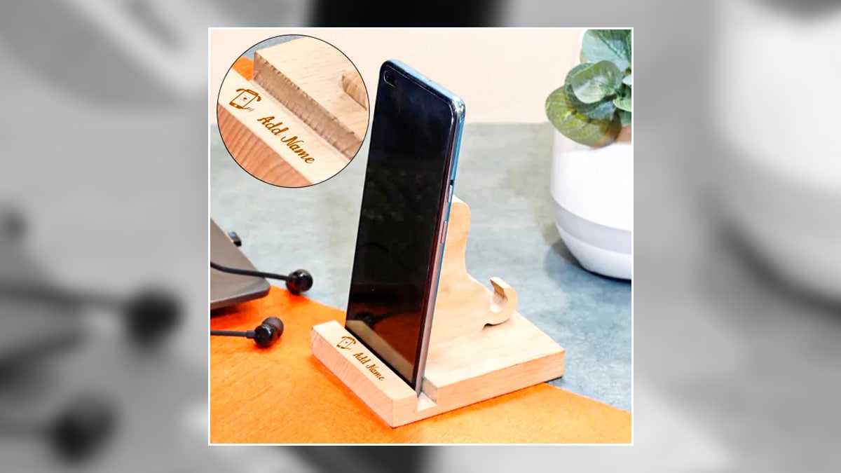 customized wooden phone stand engraved by your son in law's name. 