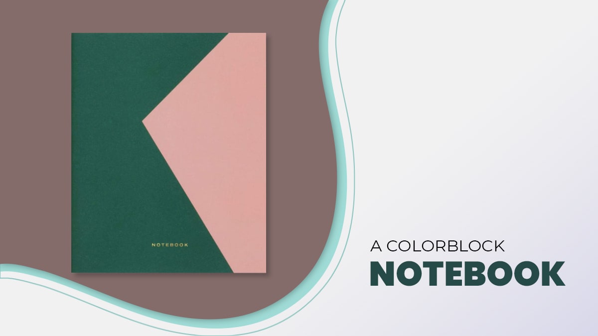 A green pink covered colorblock notebook