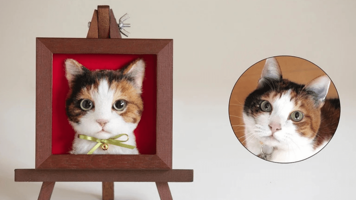 A personalized felted face of a pet from photograph shown as a pet memorial gift for the loss of a pet.
