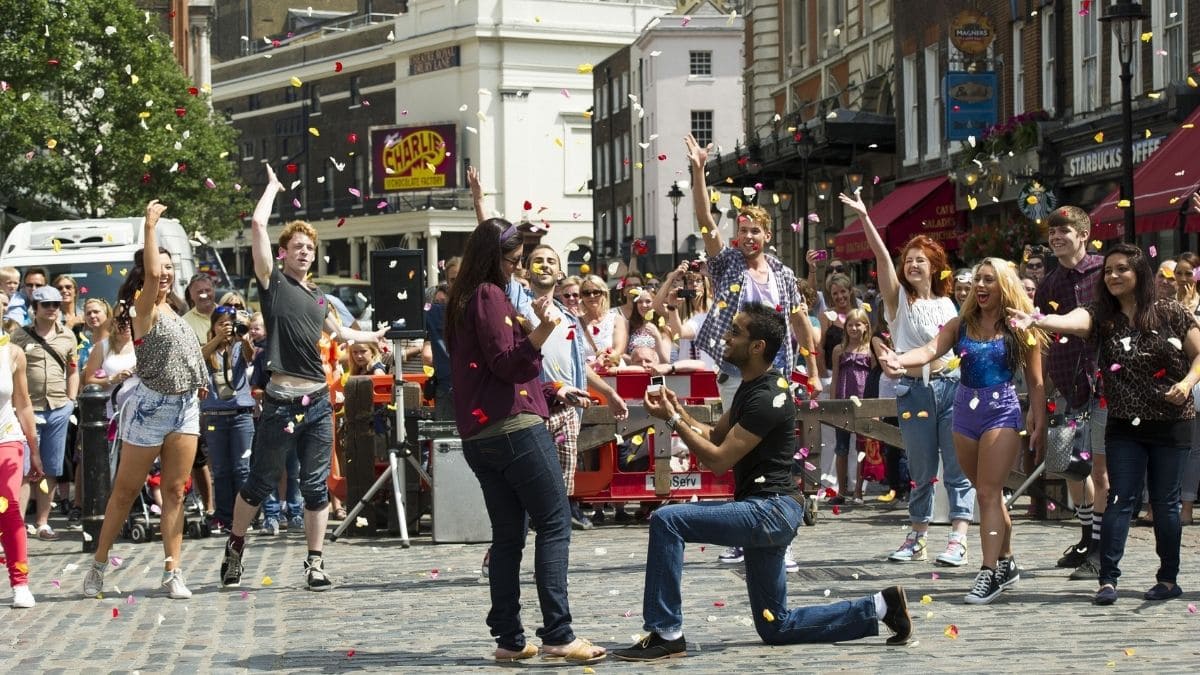 A proposal with the help of a flash mob shown as one of the best proposal ideas
