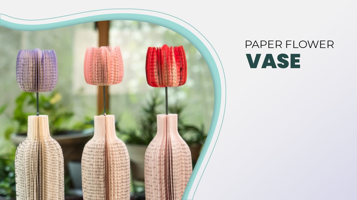 3 different colored paper vases with flowers as paper anniversary gifts.