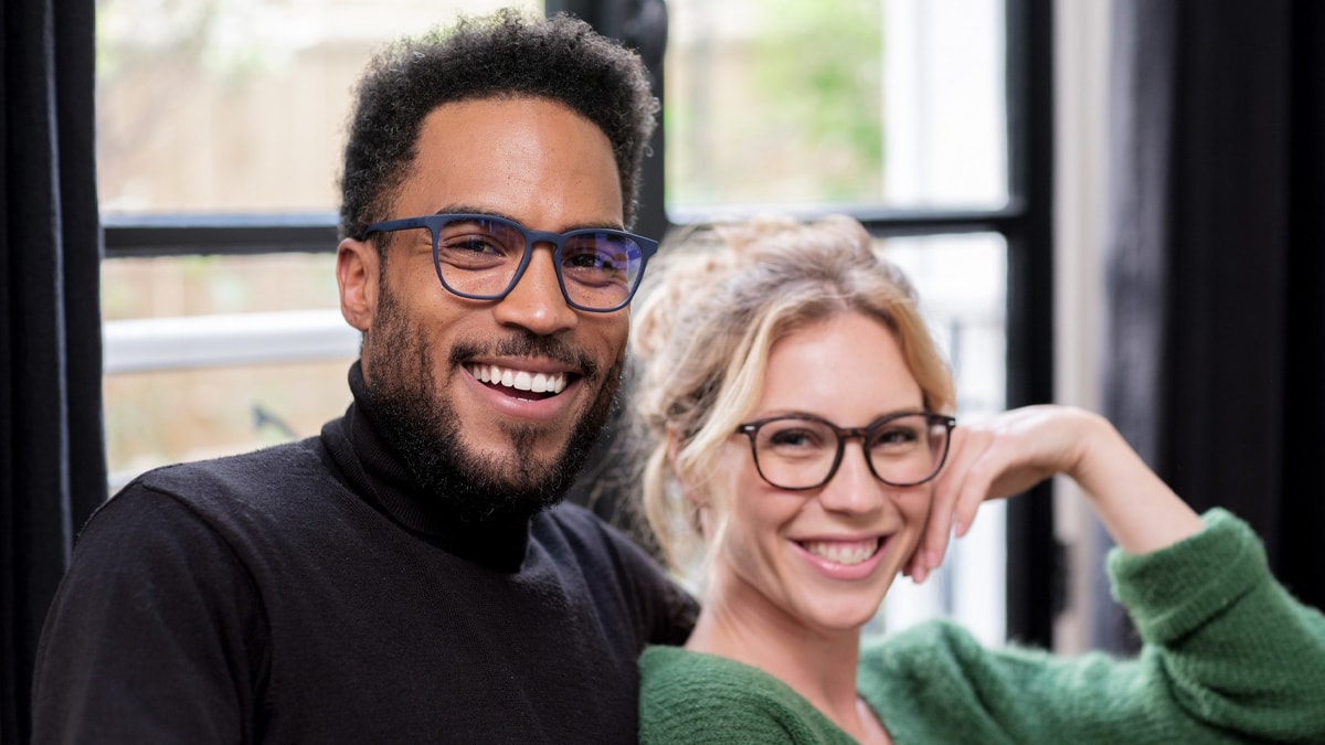 A man and a woman wearing eco friendly glasses