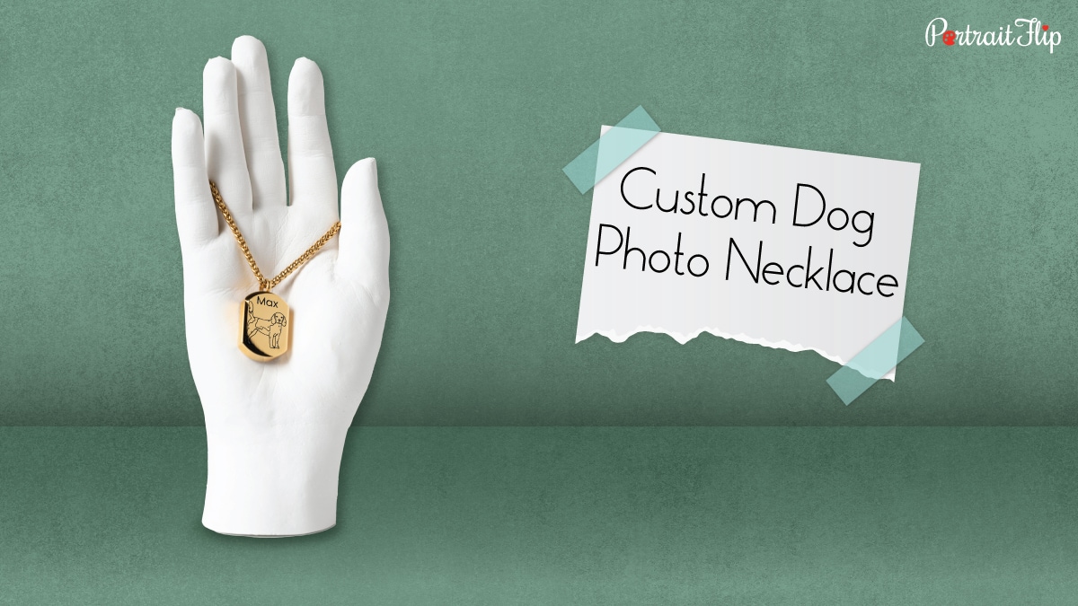 a golden necklace with a dog photo on it