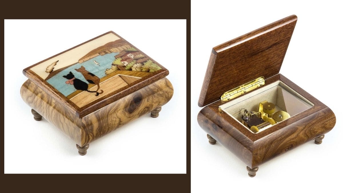 a wooden musical box that plays the song of a couple's wedding shown as one of the personalized anniversary gifts for her