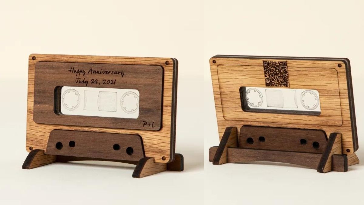 a wooden mixtape cassette that has a scan code inscribed on it that will play the songs you want once you scan it