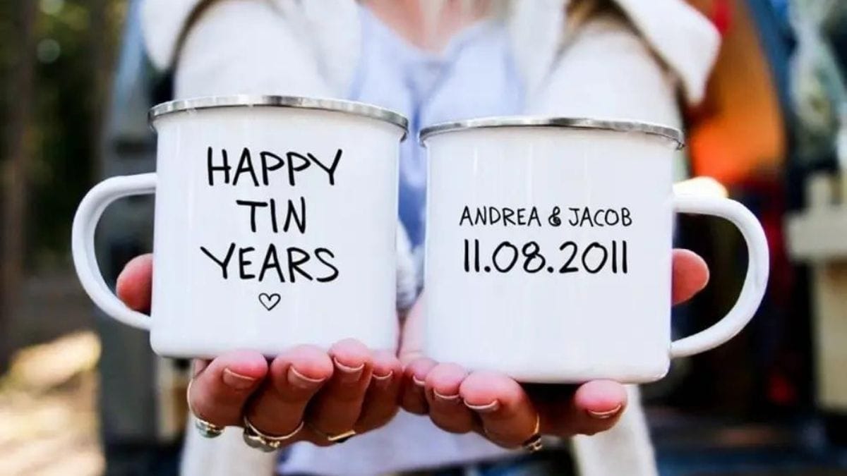 tin cups shown as one of the personalized anniversary gifts for her