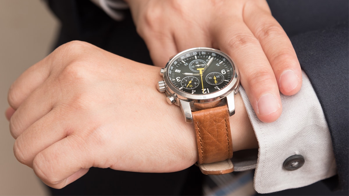 a watch on a wrist of a man