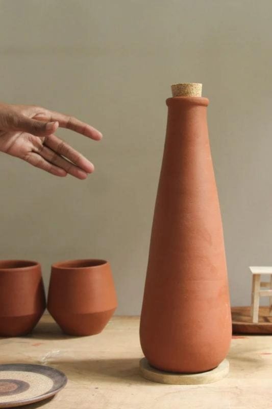 a beautiful terracotta water bottle as one of the most unique gift ideas for him for Christmas