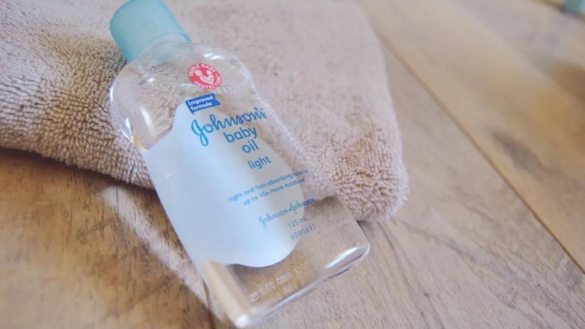 baby oil shown as a method to not use while cleaning an oil painting