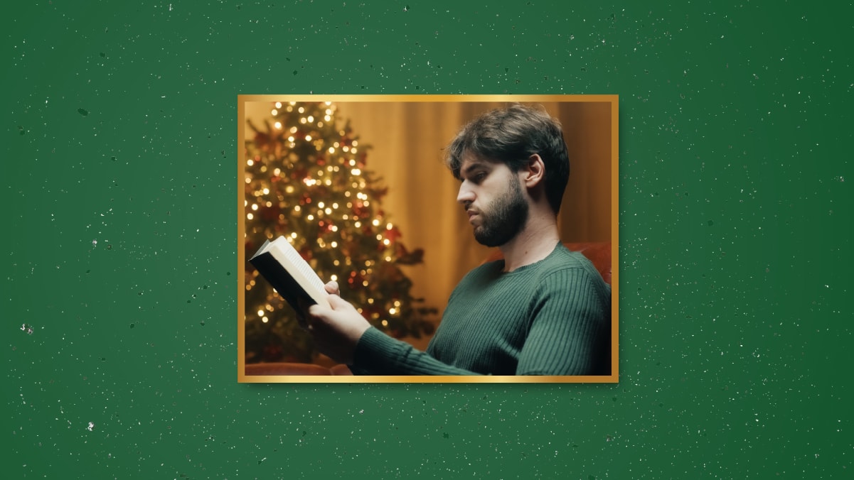 a man reading a book on the Christmas eve