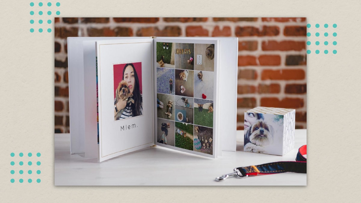 a dog photo album is placed on a white table