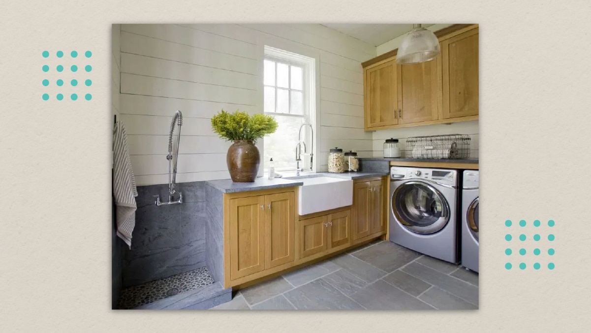 a kitchen with a dog wash station on its left