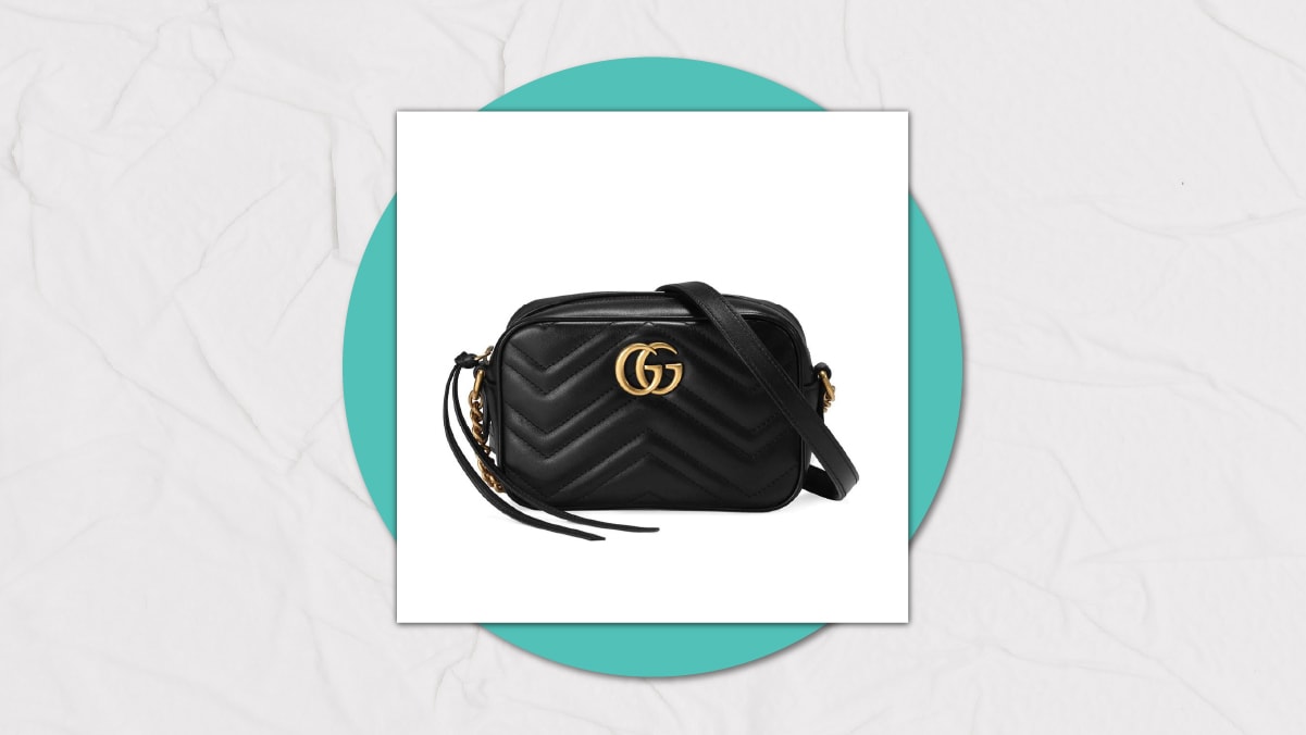 a glossy black mini bag
