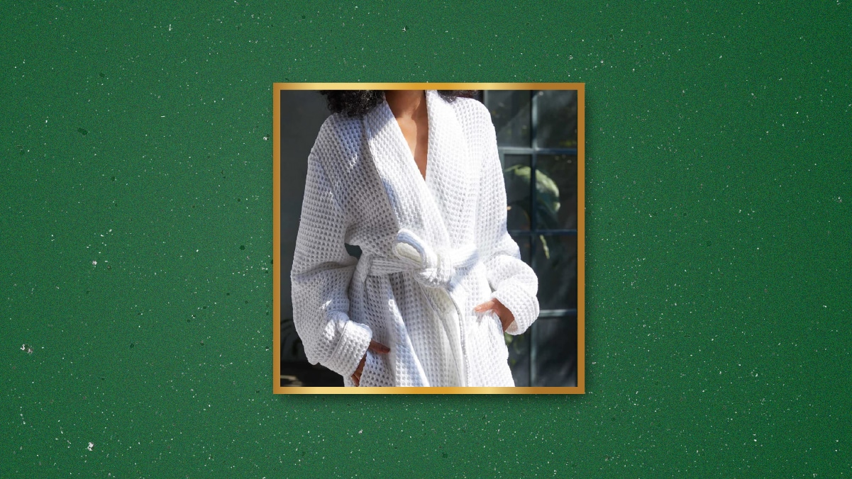 a woman in a white waffle robe