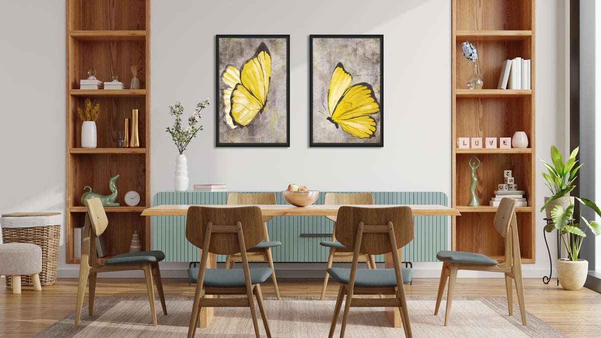 a butterfly wall art on a dining room wall