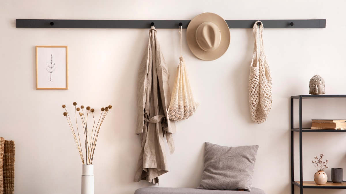 Wooden Hooks attached on an entryway wall