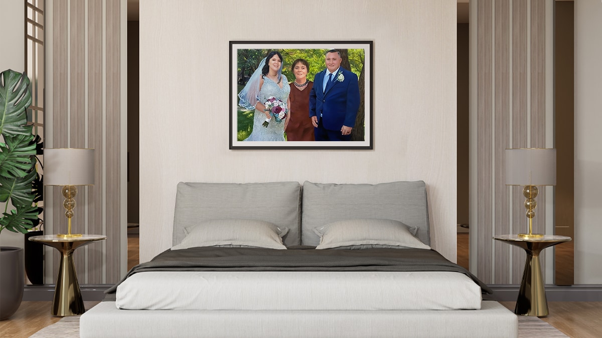 a family portrait mounted above the headboard
