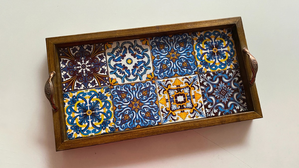 Handmade wooden tray with beautiful multicolor designs printed on the base
