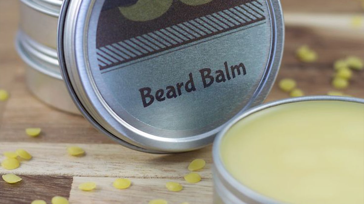 Closeup shot of beard balm placed on a wooden table