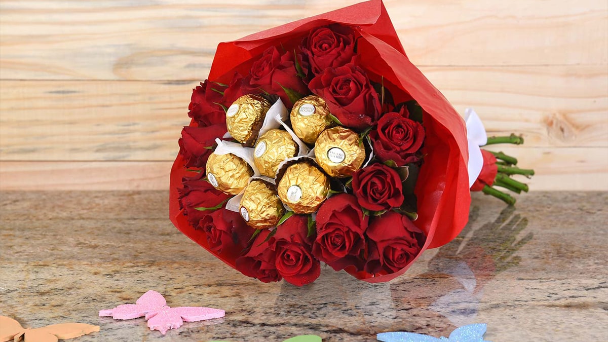 Bouquet of chocolate roses kept on tiles 