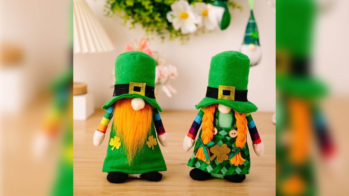 Two Leprechaun Stuff Toy placed on a wooden table 