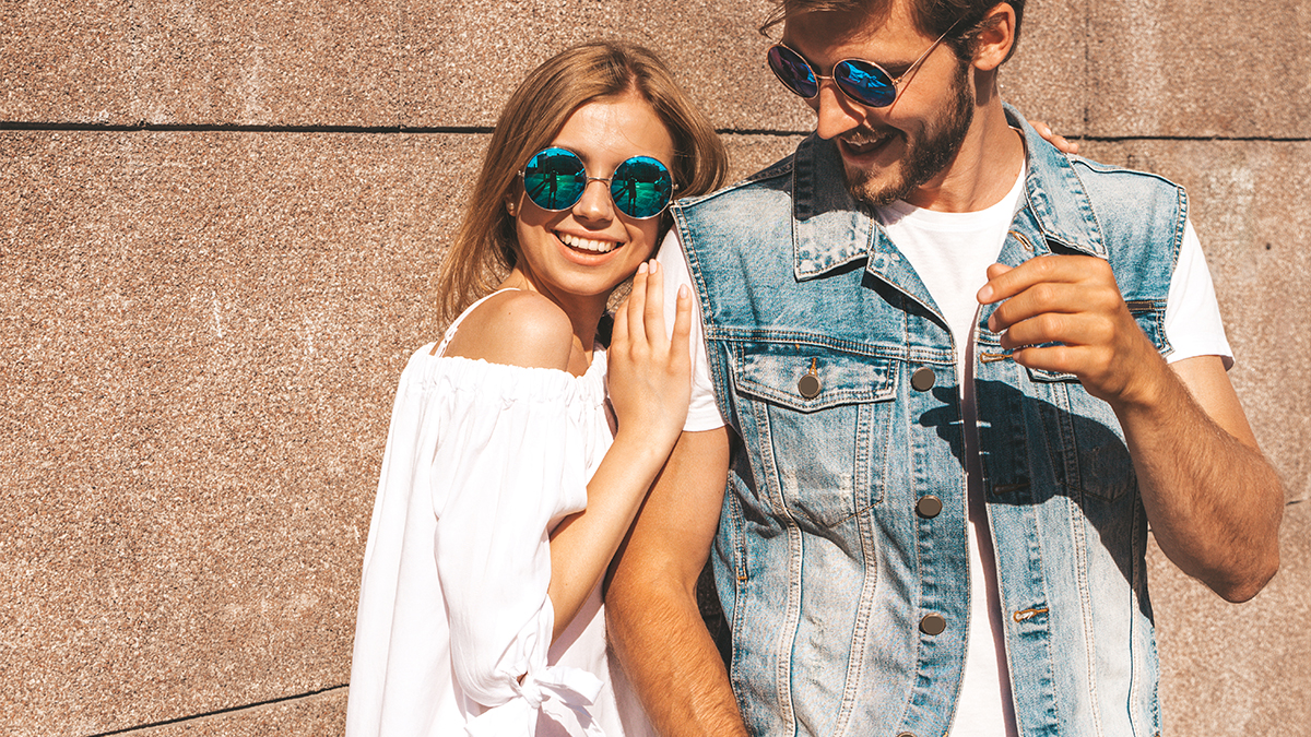 Couple wearing same blue shade glasses  