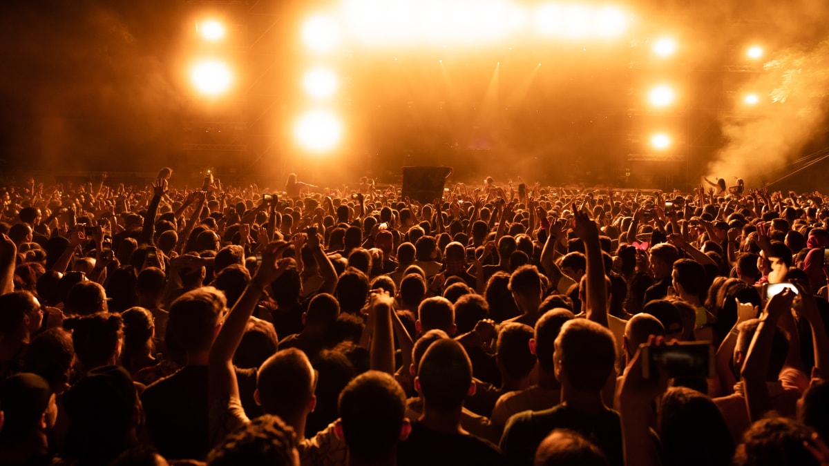 Crowd of people attending a concert