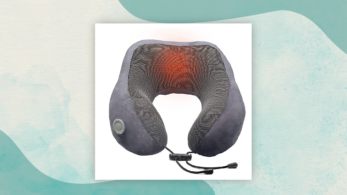 A grey colored heating neck pillow in a white background. 