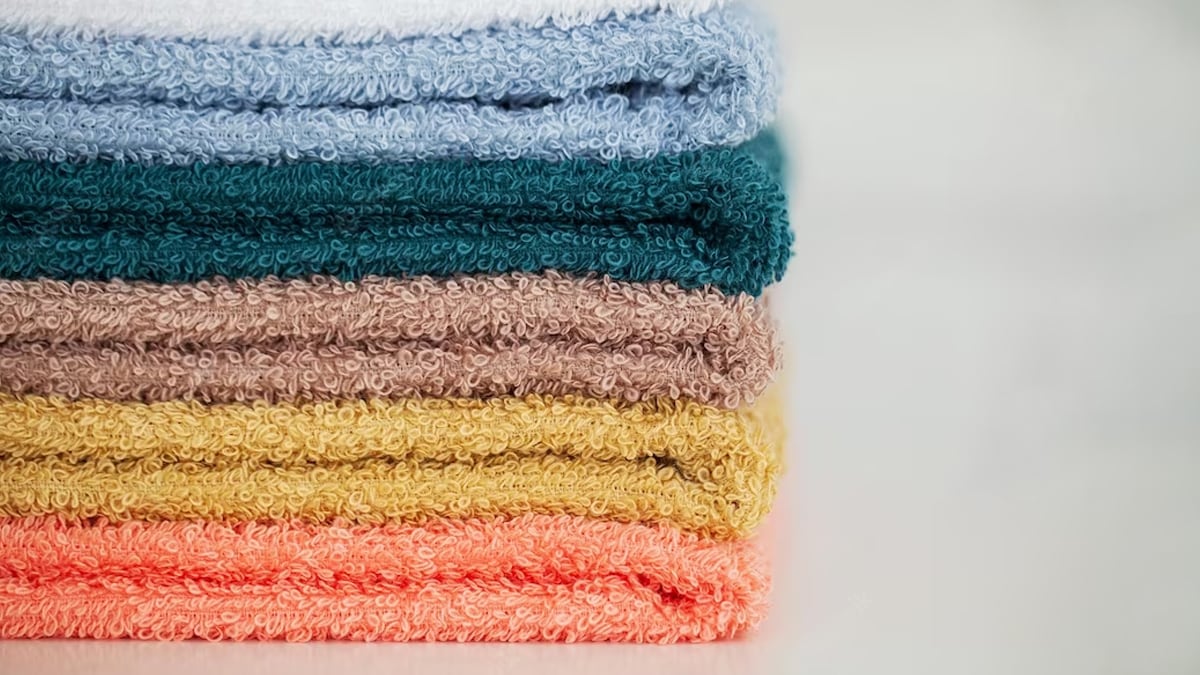 A colorful towel set with white background.