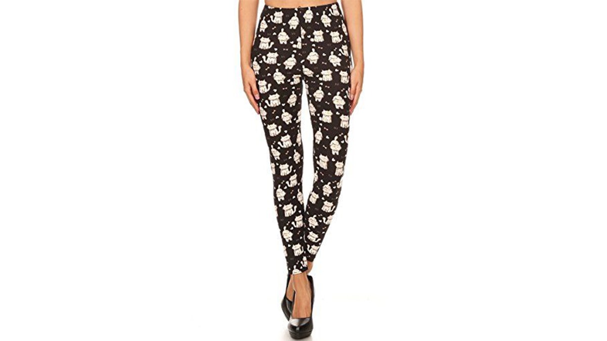 A black colored pair of cat printed leggings in a white background. 