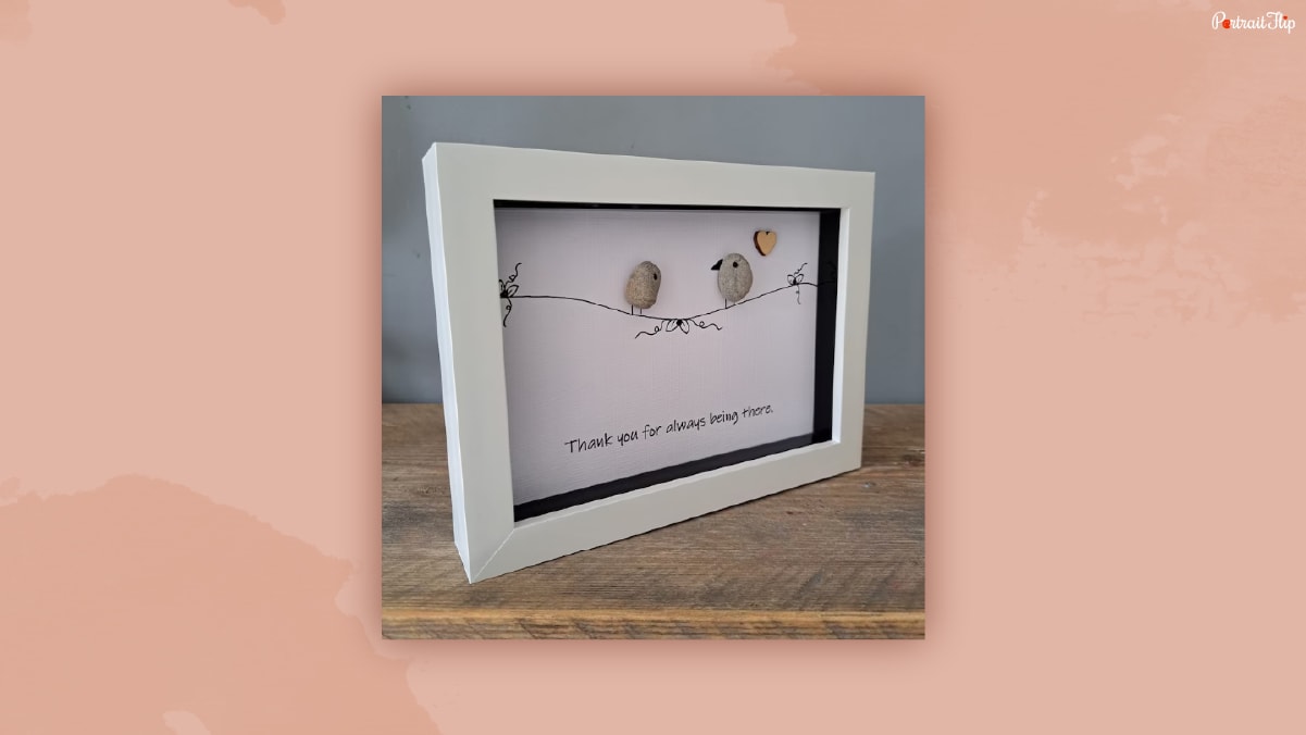 A pebble art picture as thank-you gifts for women.