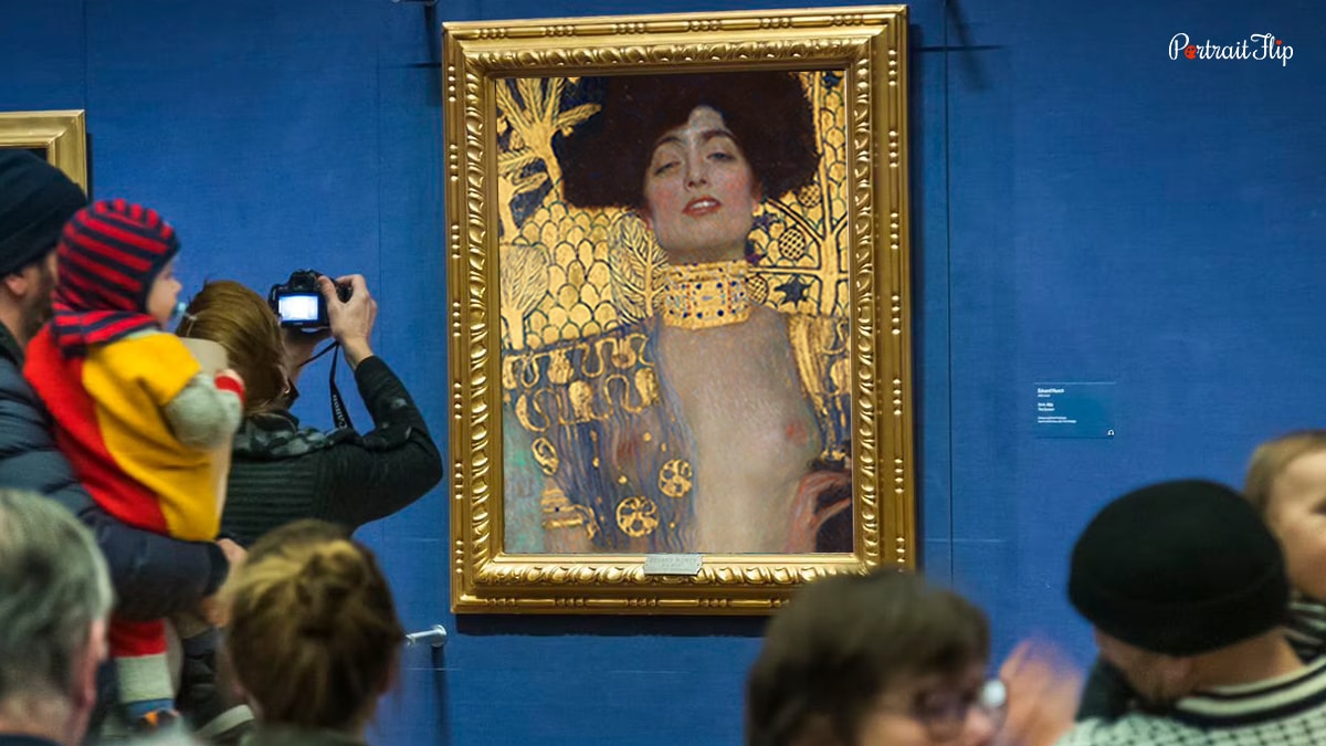 People clicking picture of Judith.