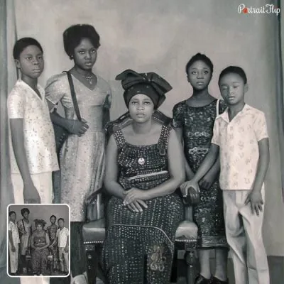 A black and white vintage portraits of a woman sitting on a chair with four girls standing around her