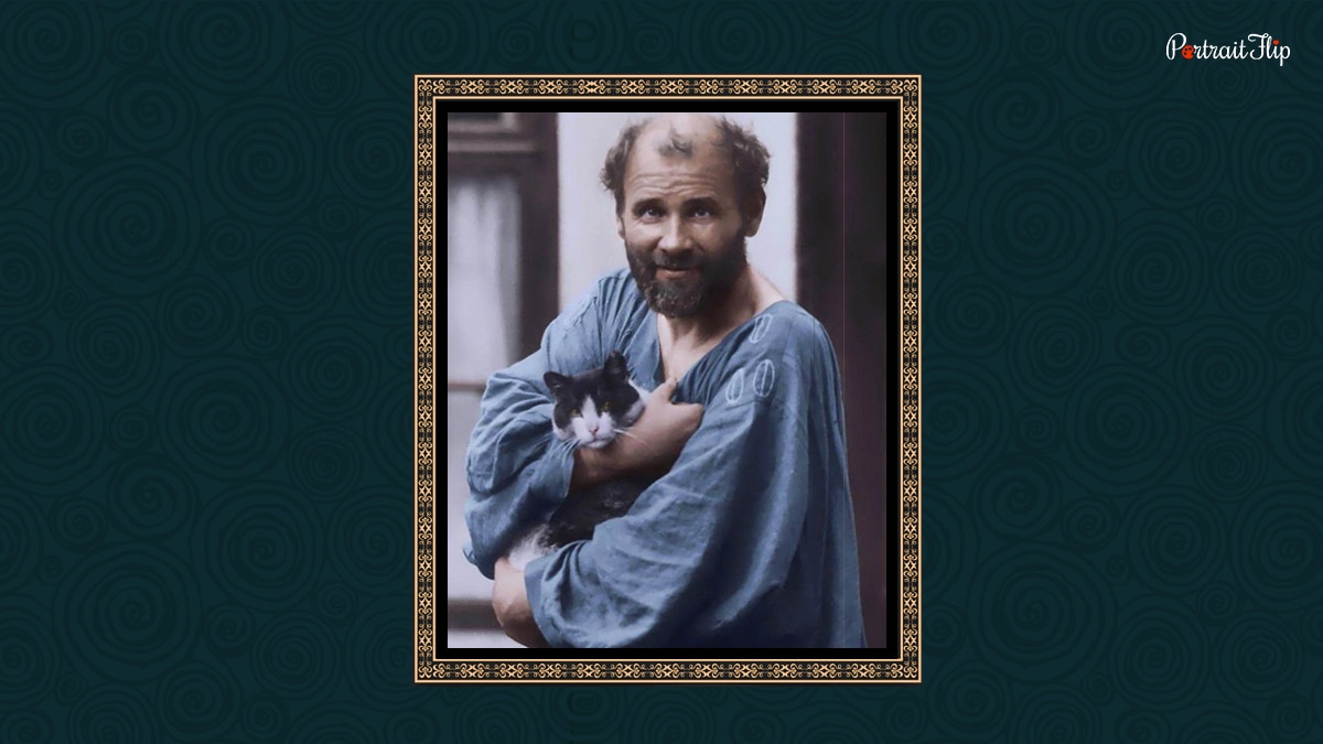 The famous painter Gustav Klimt with his cat.