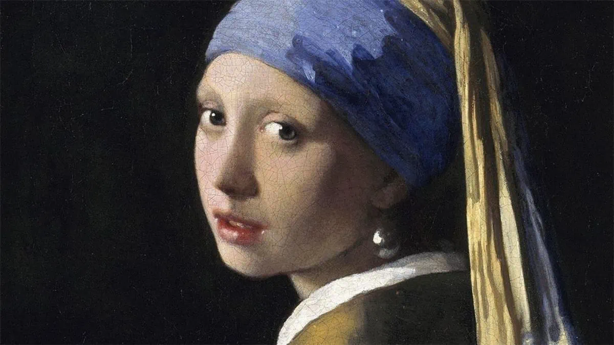 The Girl with a Pearl Earring By Johannes Vermeer is a painting of a girl  look at her audience with a blue scarf and a pearl earring. 