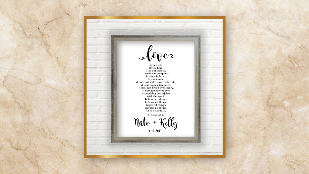 A wooden frame with love notes in it written with black ink on a white background. 