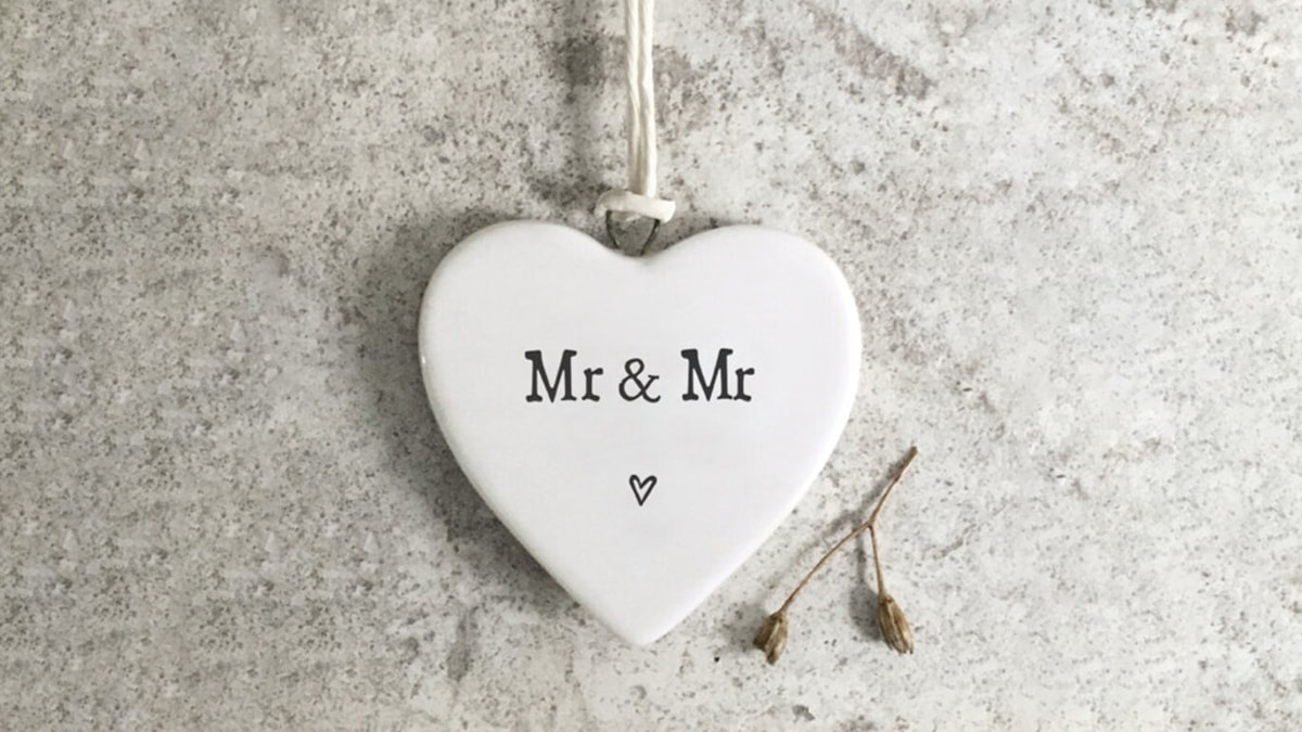 A porcelain heart engraved with Mr & Mr text as a gifts for gay men.