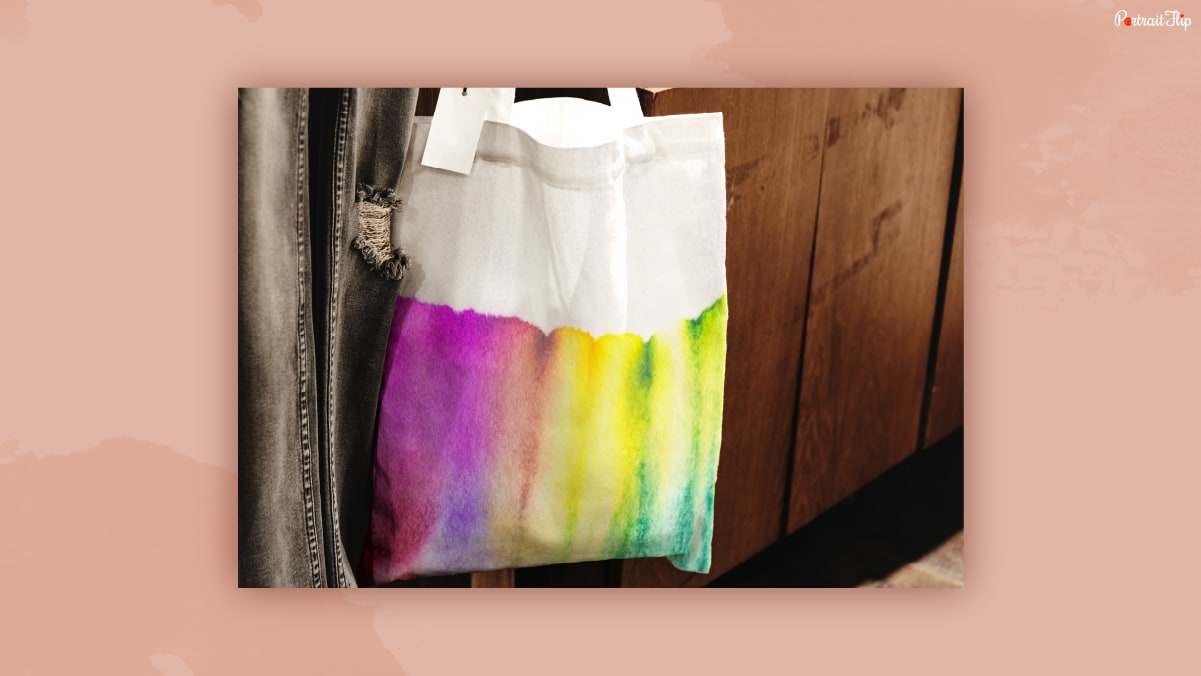 A colorful and white combo of textile pouches that could be one of the thank-you gifts for women.