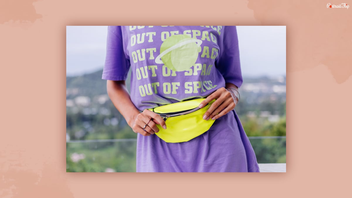 Middle shot of a woman wearing waist bag that could be one of the thank-you gifts for women.