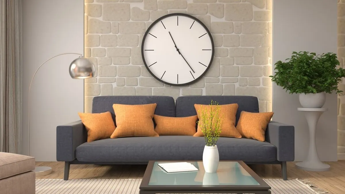 A giant wall clock hanged in the center wall of the living room as a gifts for gay men.